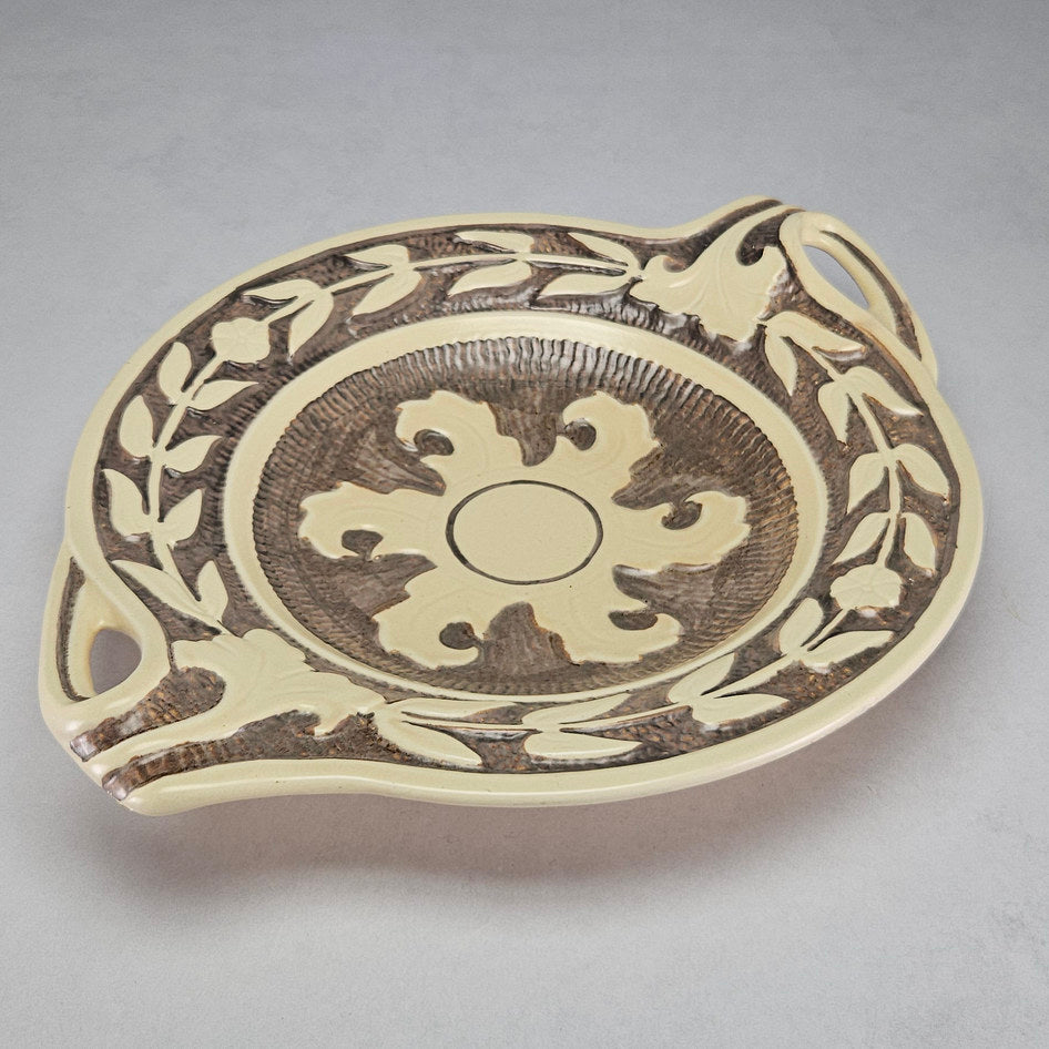 Close up of Burleigh Ware bowl's integrated handle