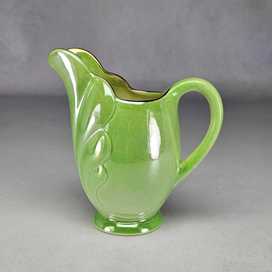 Maling green lustre leaf jug with raised botanical decoration and handle