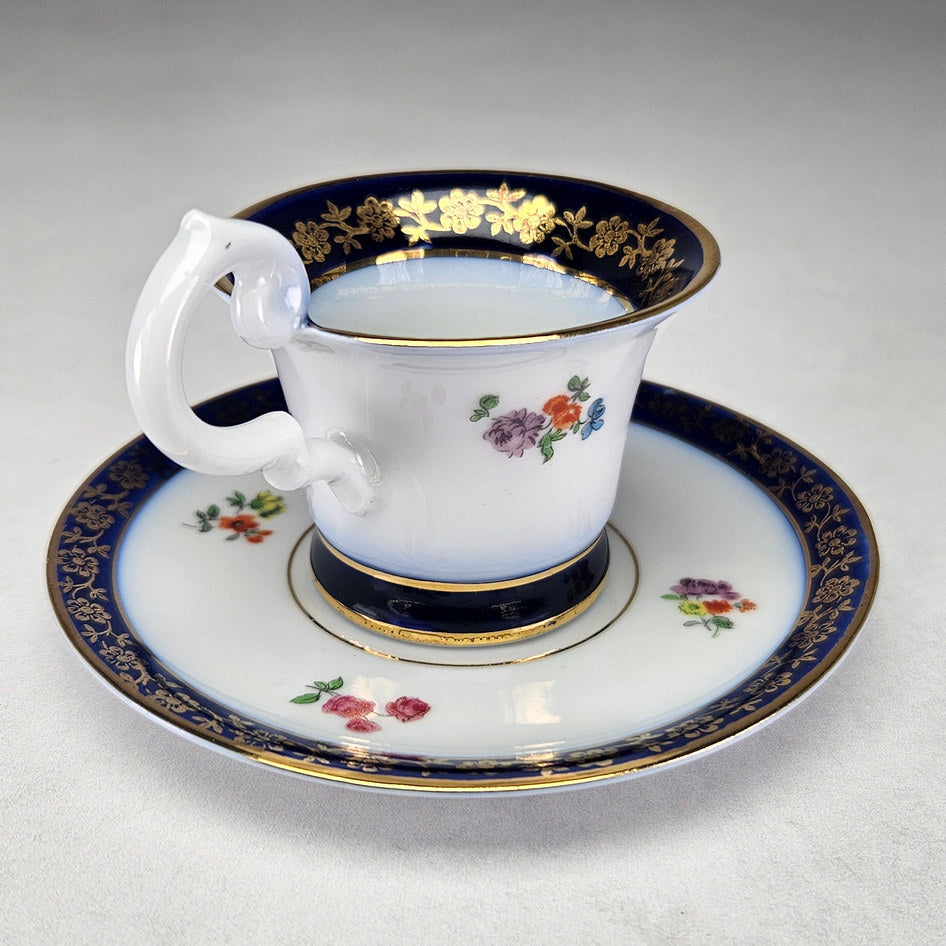 Tivoli inscribed cup and matching gilt floral saucer