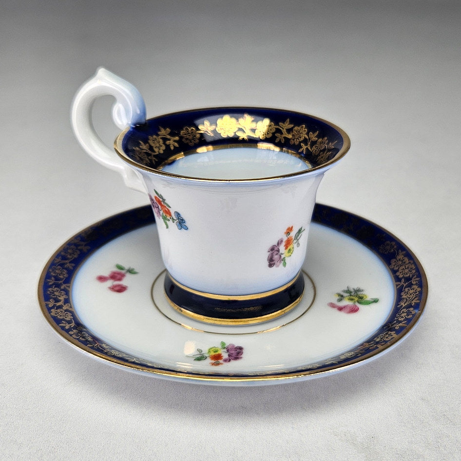 Cobalt band and flower sprigs on Tivoli porcelain cup