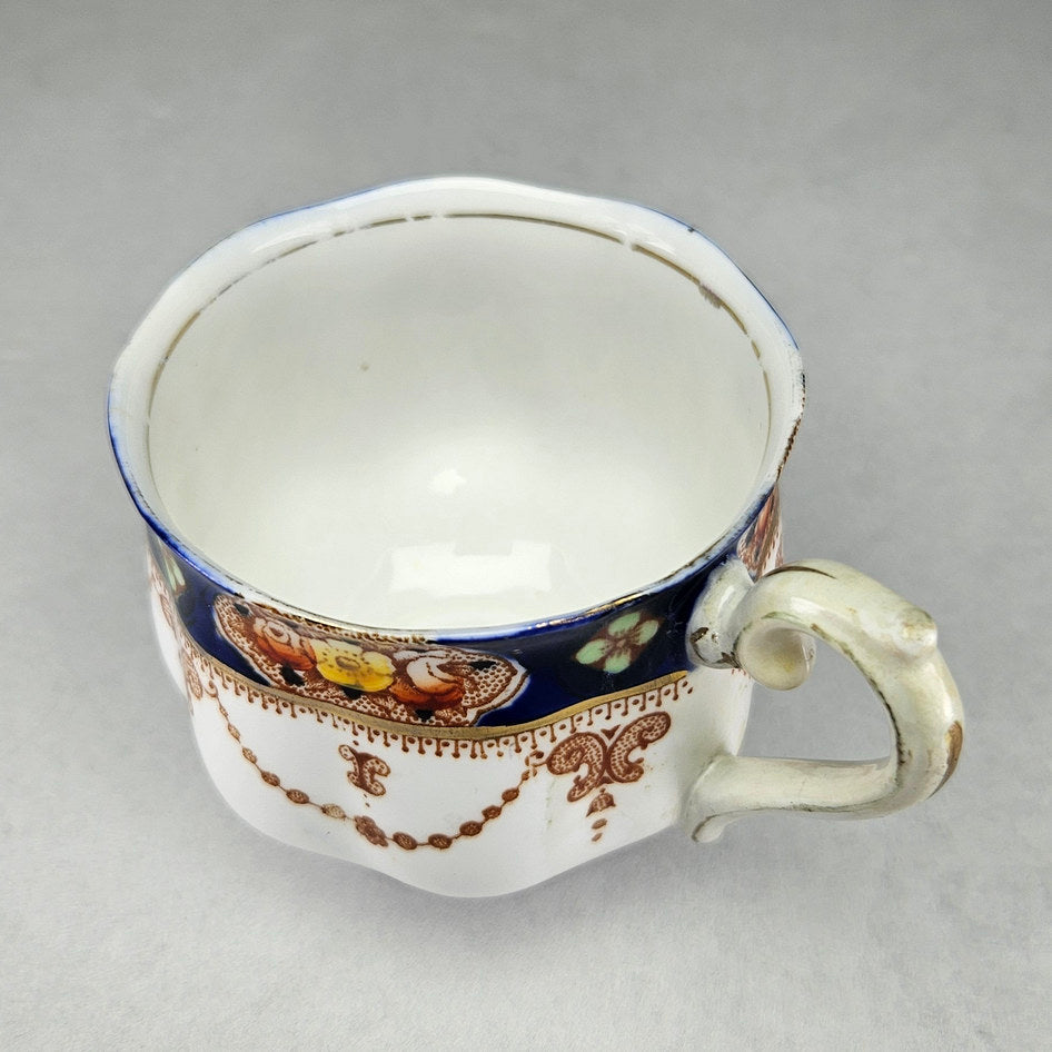 Overhead view of cobalt bordered Royal Albert teacup