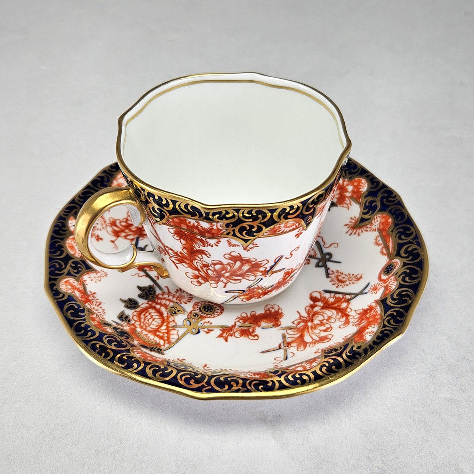 Derby Imari saucer with iron-red birds and flowers