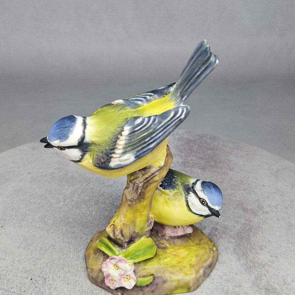 Close up of blue tits figurine's painted feather detail