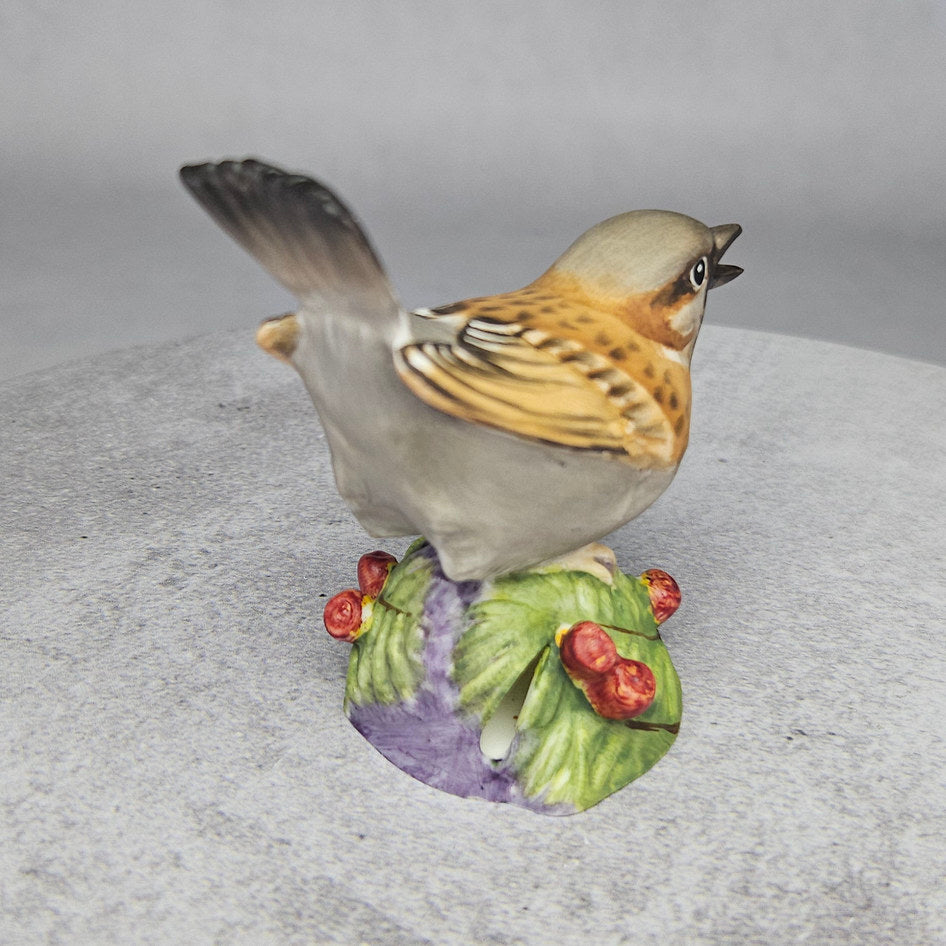 Royal Worcester sparrow figurine on leafy berry base, rear view