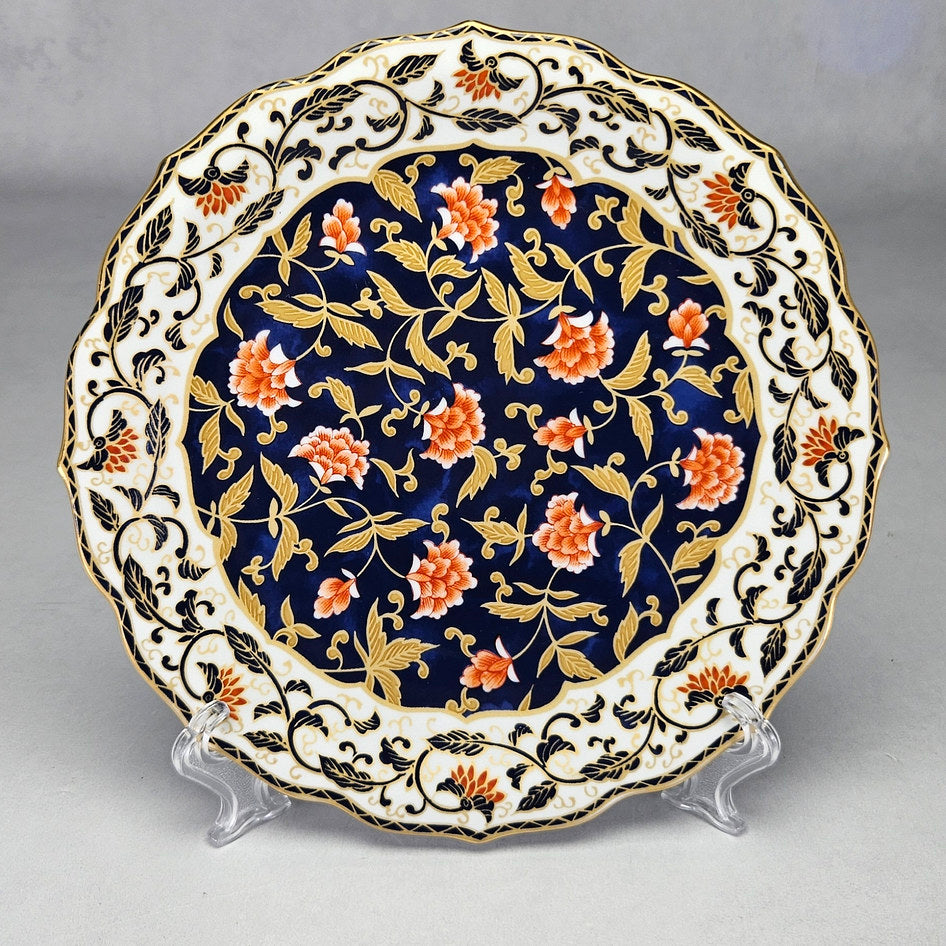 Anisa cobalt floral side plate showing coral flowers and gold foliage