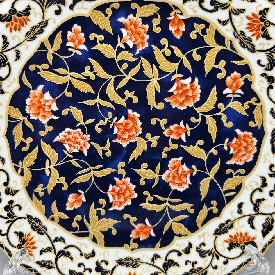 Anisa cobalt floral side plate showing its shaped ceramic form