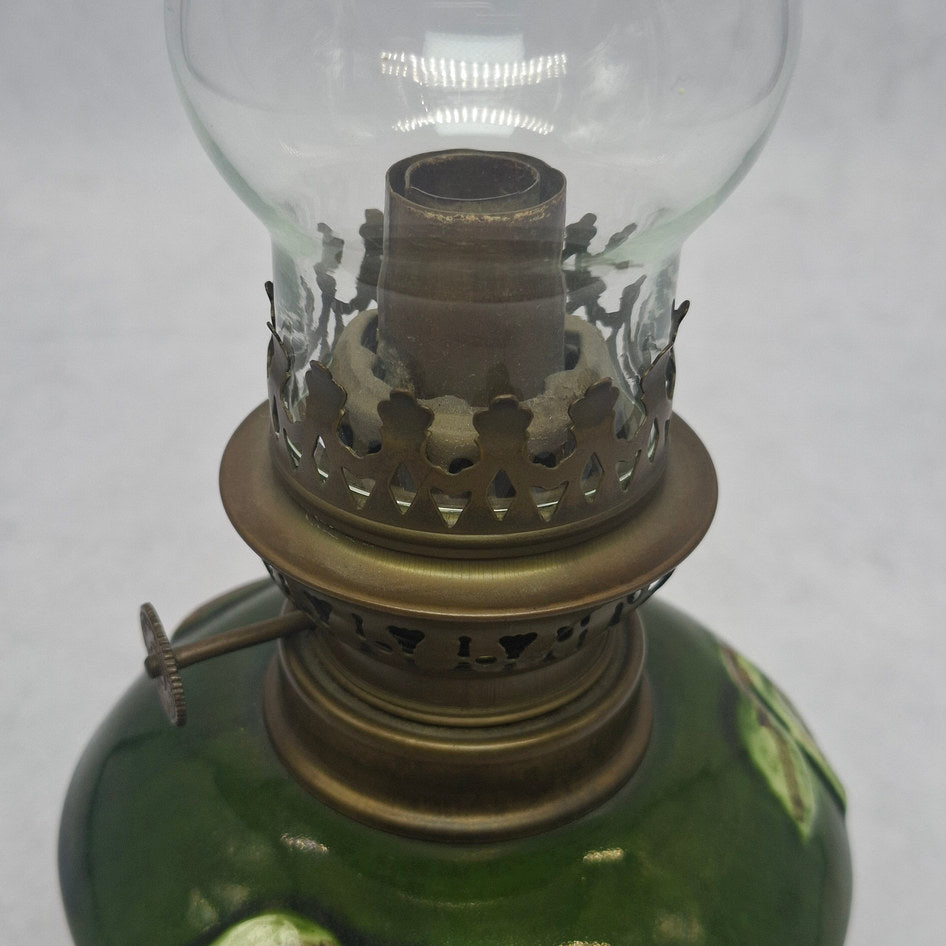 Antique Brass Kerosene Oil Lamp with Green Majolica Ceramic Cover and Glass Base
