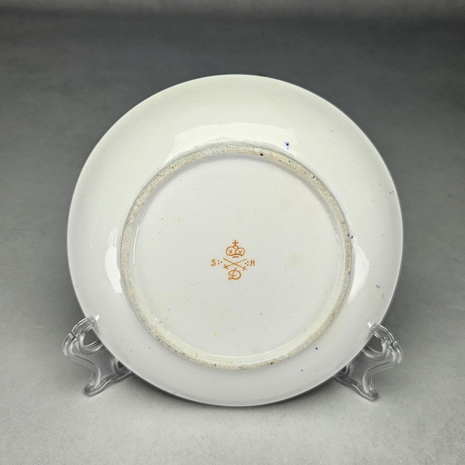 Undersides of Derby cup and saucer with painted marks