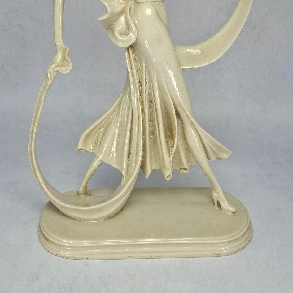 Art Deco-Style Cream Lady Figurine with Flowing Ribbon Detail