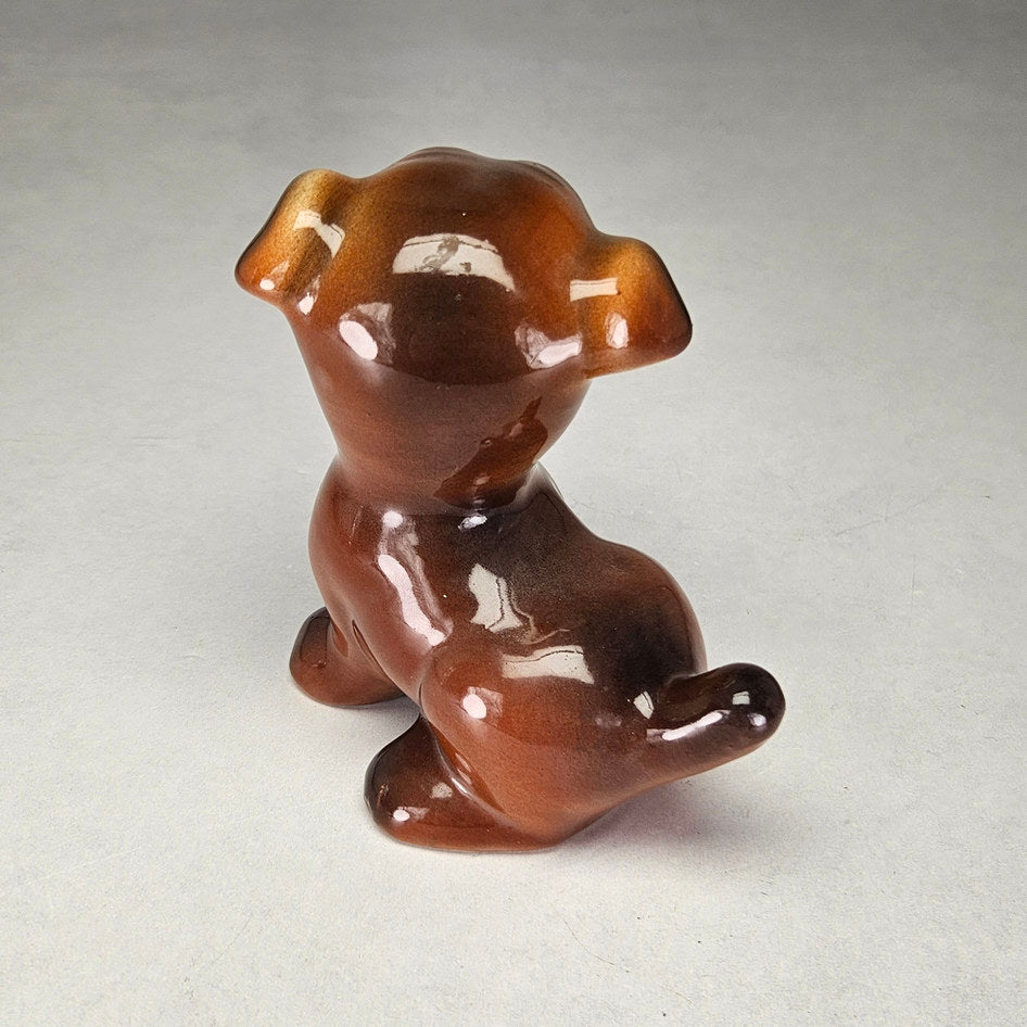 Brown cartoon dog figurine attributed to Tarcisio Tosin, photograph 3 of this collectible ceramic piece