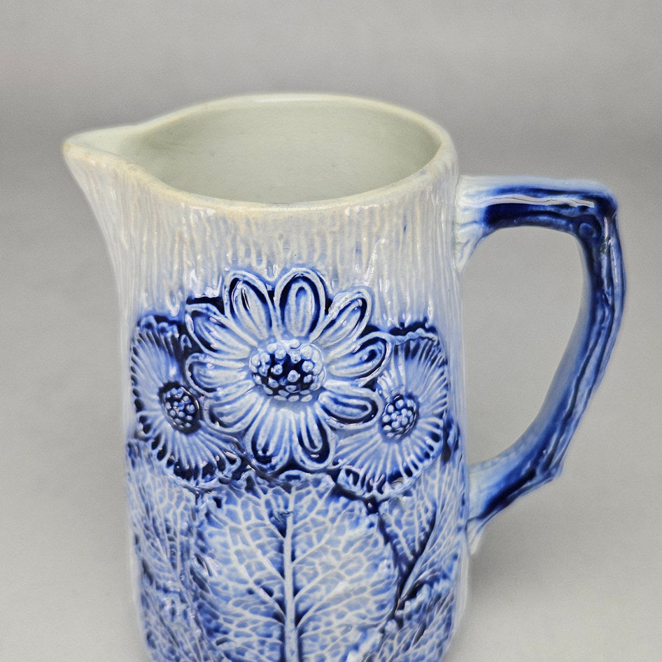 Blue and White Majolica-Style Relief Floral Ceramic Jug