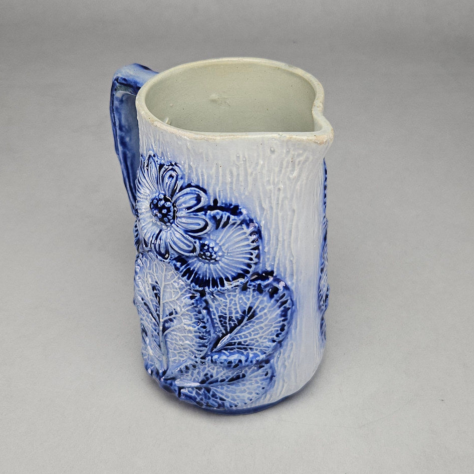 Blue and White Majolica-Style Relief Floral Ceramic Jug