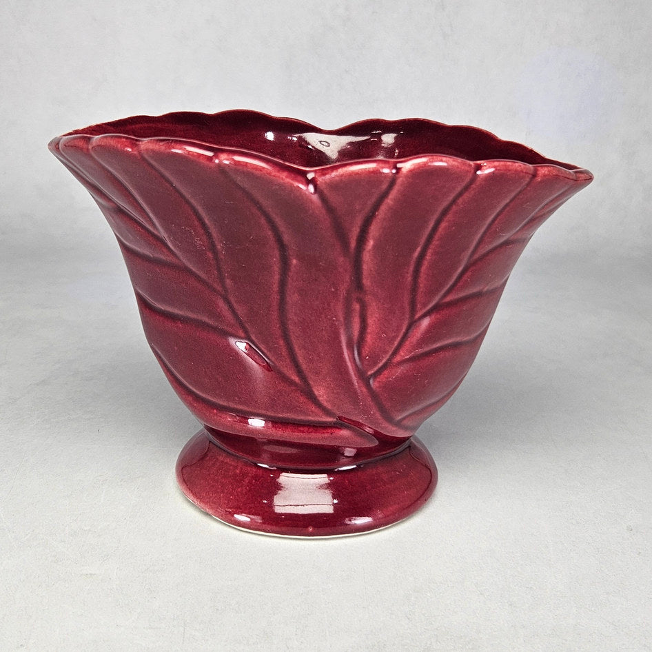 Burgundy leaf relief ceramic pedestal vase attributed to Drostdy Ware