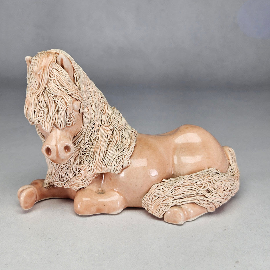 Pink Cheval Ceramics reclining pony with cream textured mane
