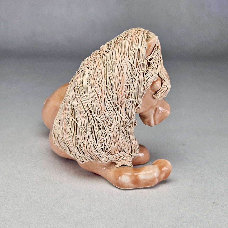 Pink Cheval Ceramics reclining pony with cream textured mane