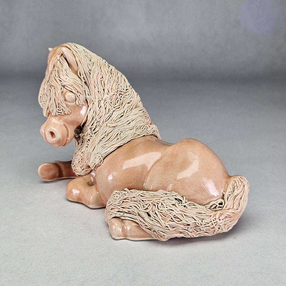 Pink Cheval Ceramics reclining pony with cream textured mane
