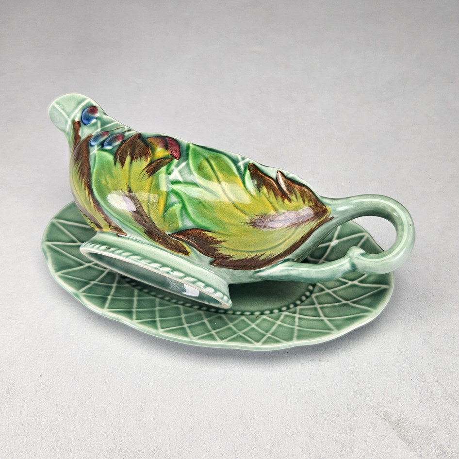 Clarice Cliff Newport leaf and berry sauce boat with stand, photograph 5 of this collectible ceramic piece