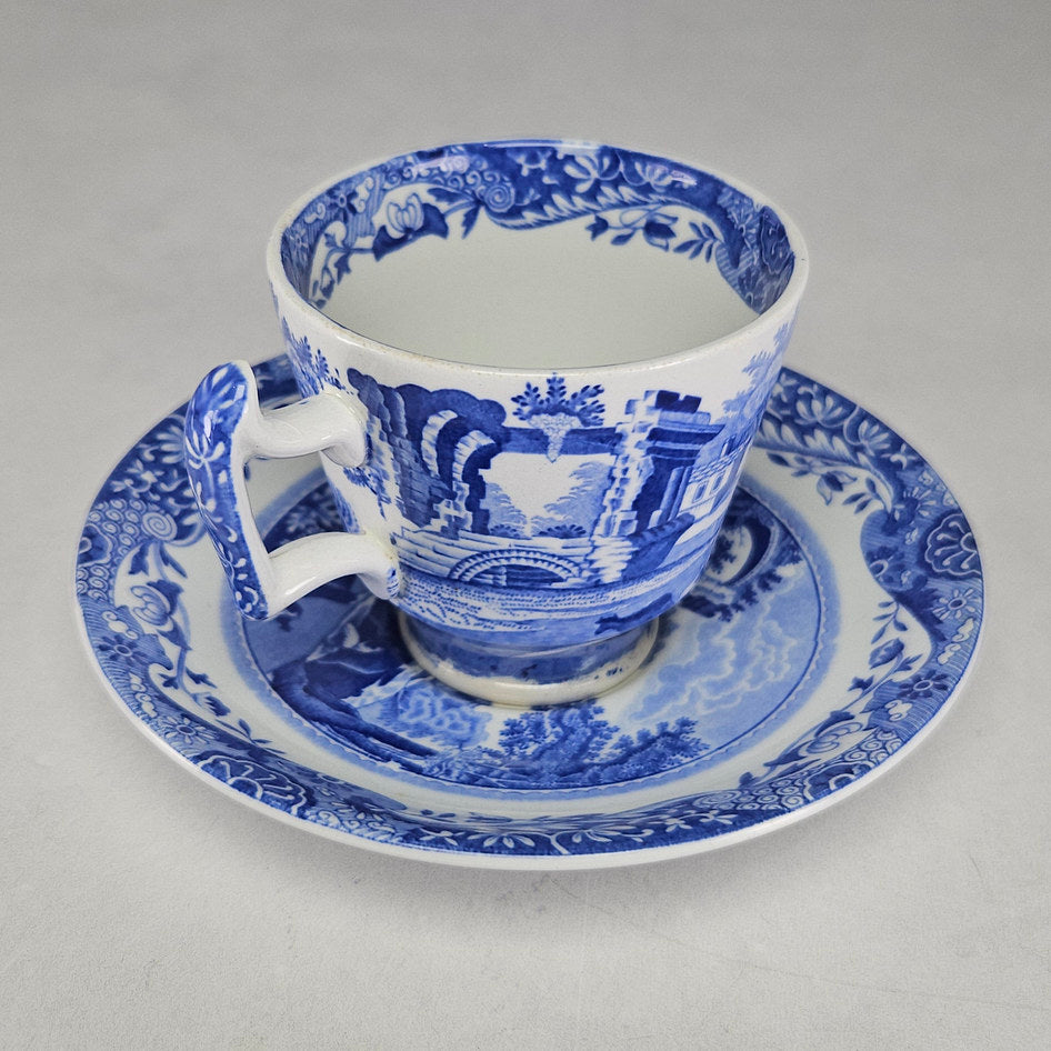 Copeland Spode demitasse cup beside matching Italian pattern saucer