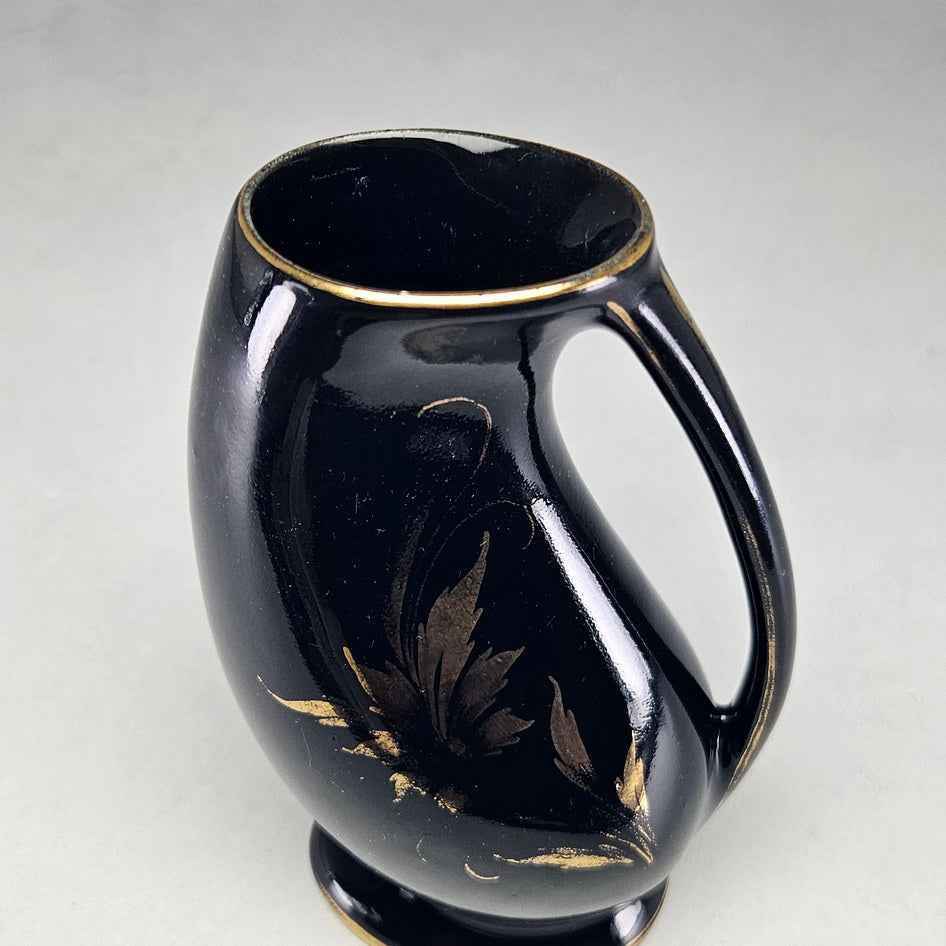 Crescent Potteries Black and Gold Floral Handled Pedestal Vase