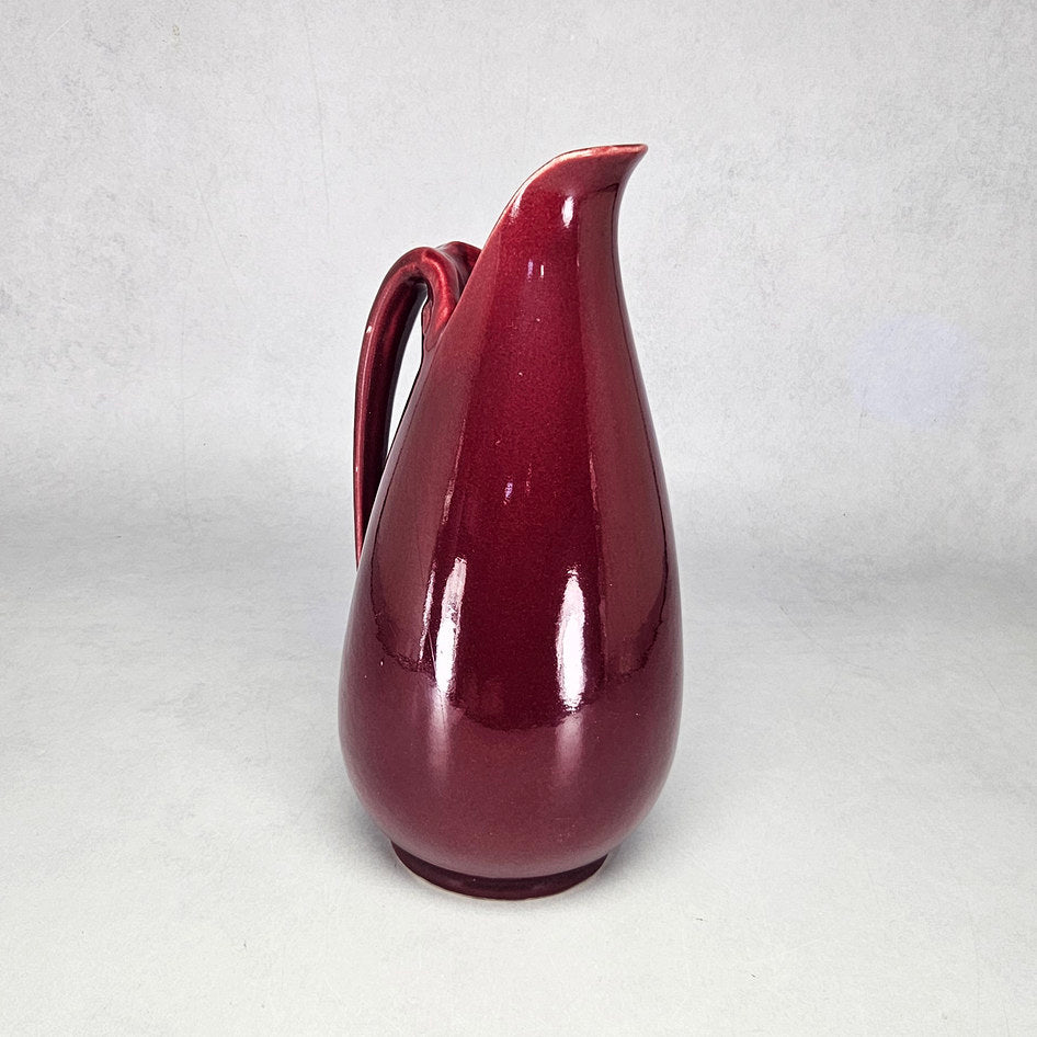 Drostdy Ware burgundy tall ewer showing elongated teardrop body