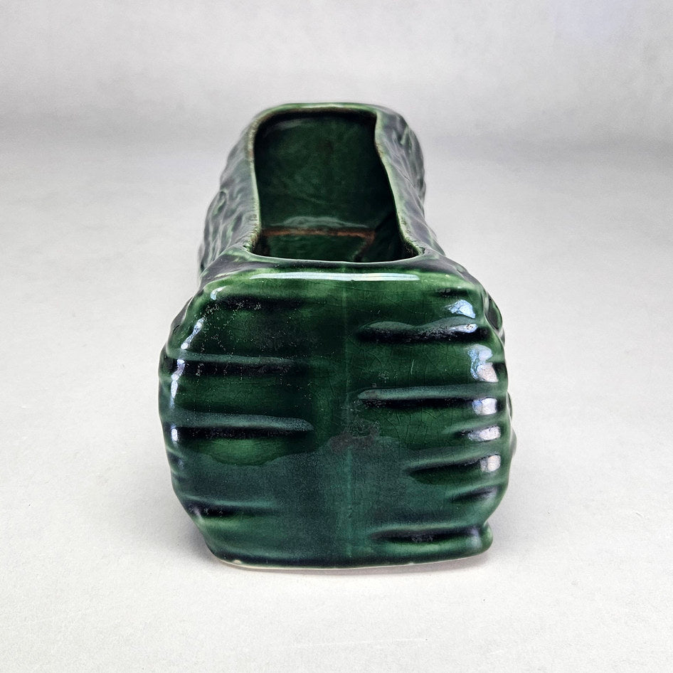 Drostdy Ware green log planter showing rounded ceramic end