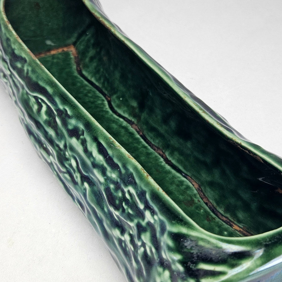 Drostdy Ware green log planter showing elongated planting opening
