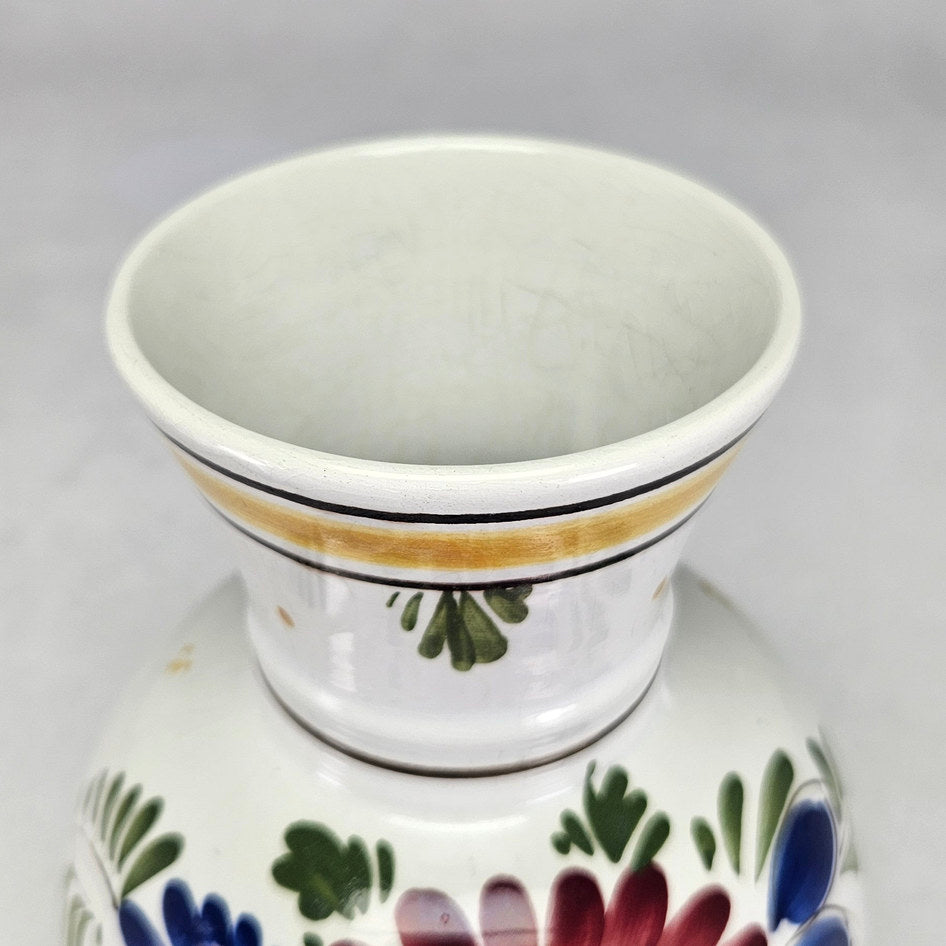 Dutch polychrome floral vase showing flared opening and yellow band