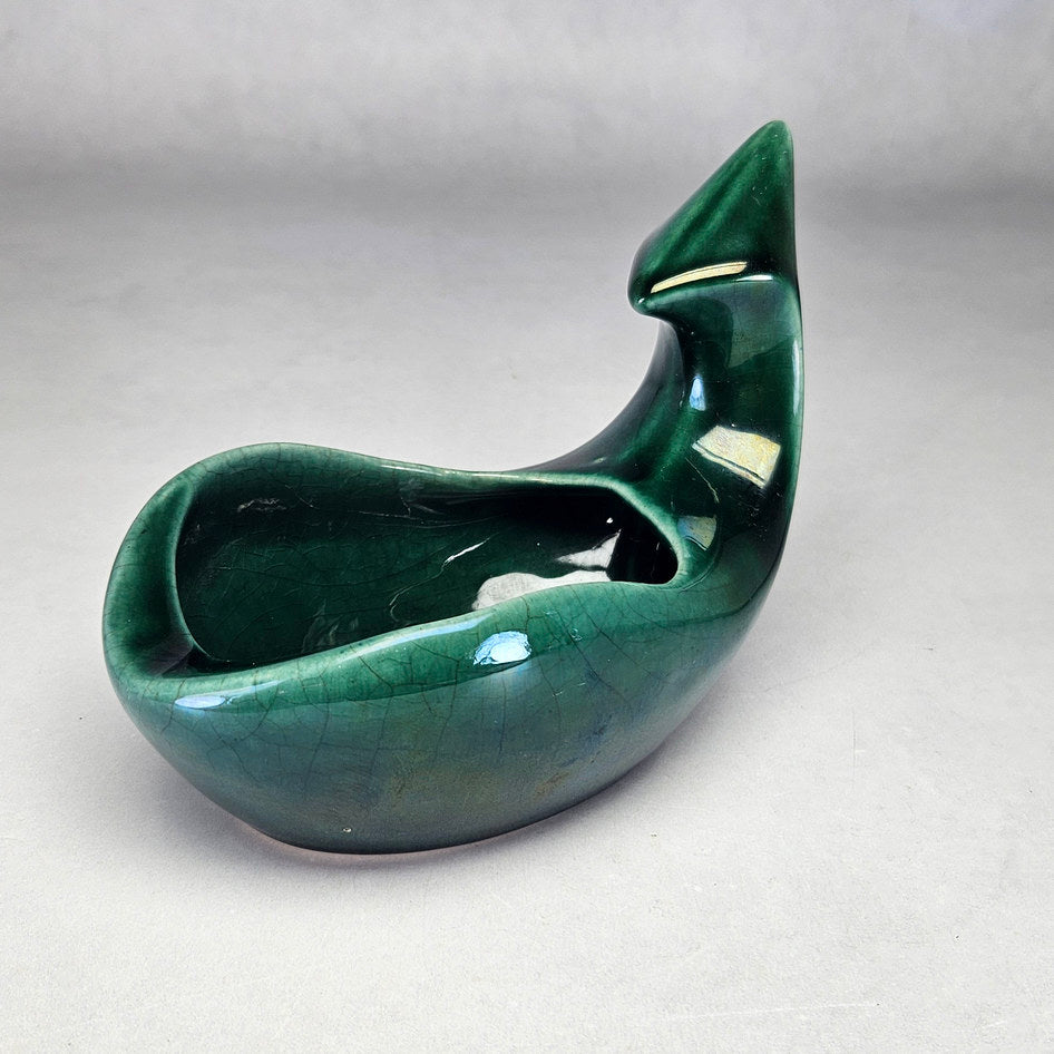 Flora-Ann green abstract planter showing curved bowl and opening