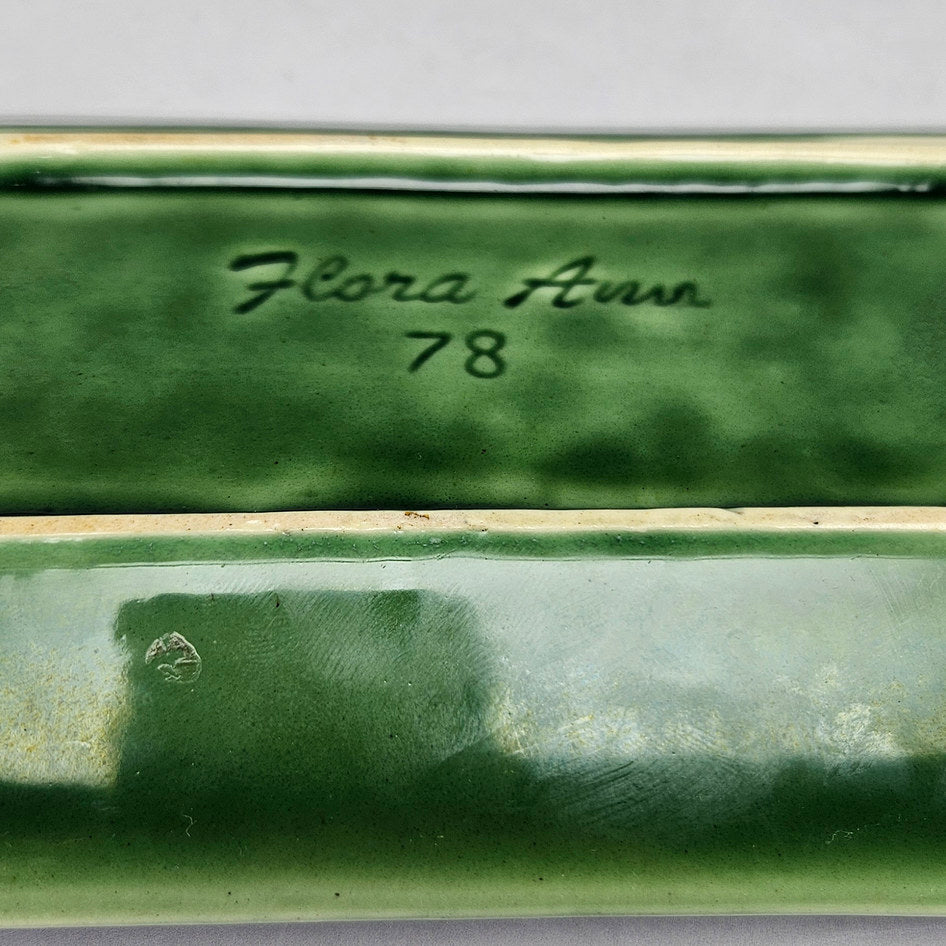 Flora-Ann green rectangular planter base close-up showing impressed marking