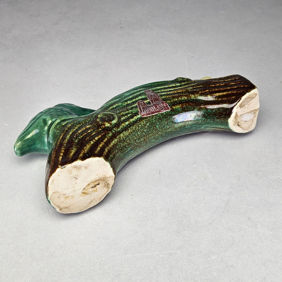 Lucia Ware bird log planter underside showing ceramic base