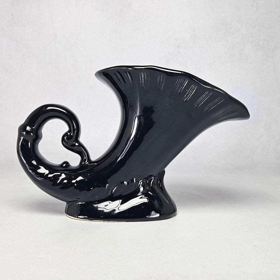 Lucia Ware black ceramic cornucopia vase with curled scroll end