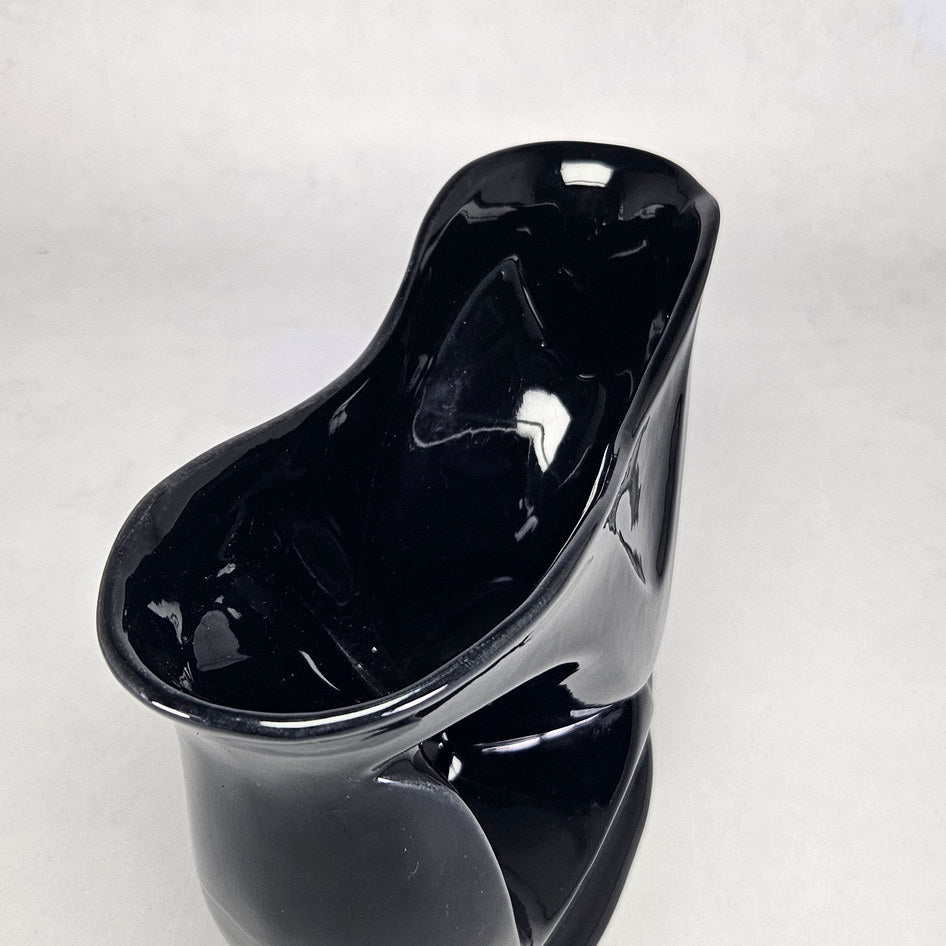 Lucia Ware black ceramic mantel vase with pierced teardrop openings