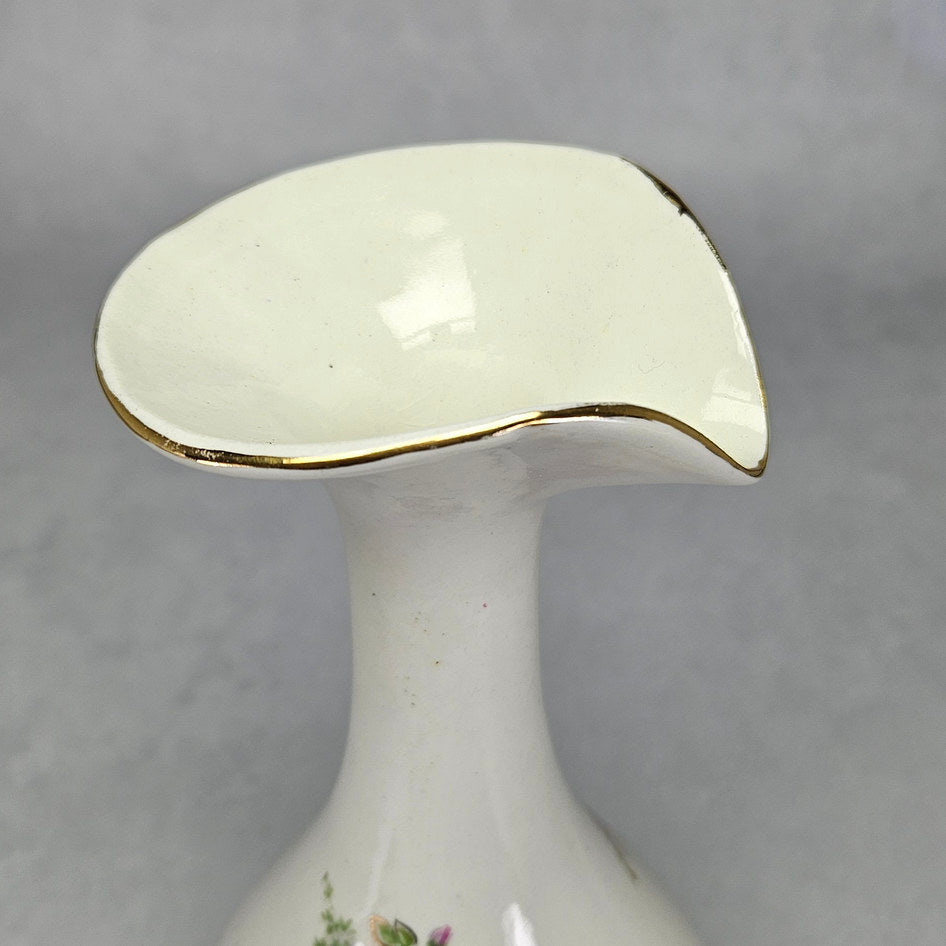 Lucia Ware cream ceramic vase with pink roses and gilt