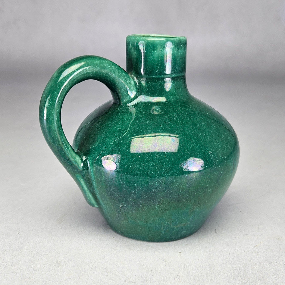 Lucia Ware green bottle vase showing rounded ceramic body