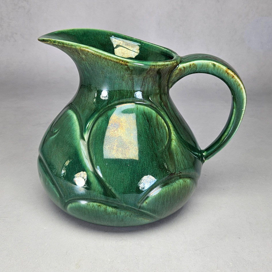 Lucia Ware green scroll jug with large loop handle