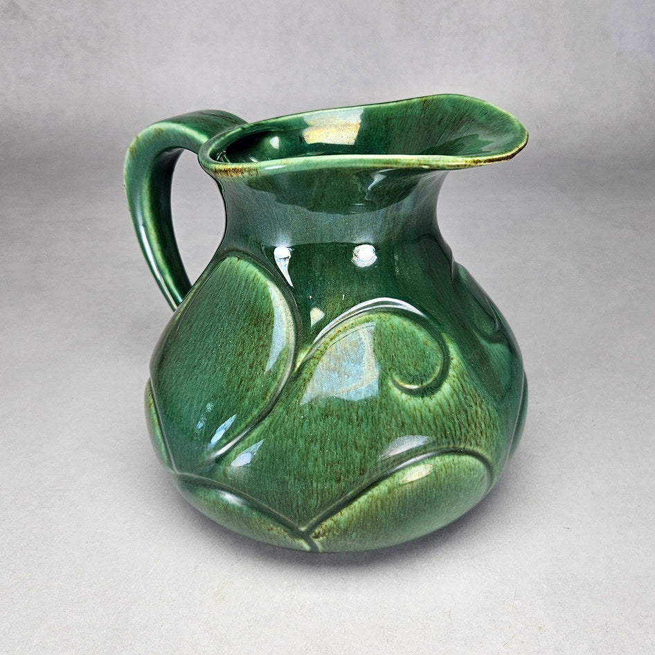 Lucia Ware green scroll jug showing broad pouring lip