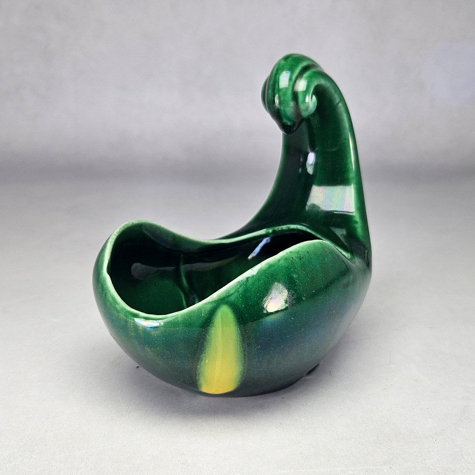 Lucia Ware green scroll planter showing yellow front detail