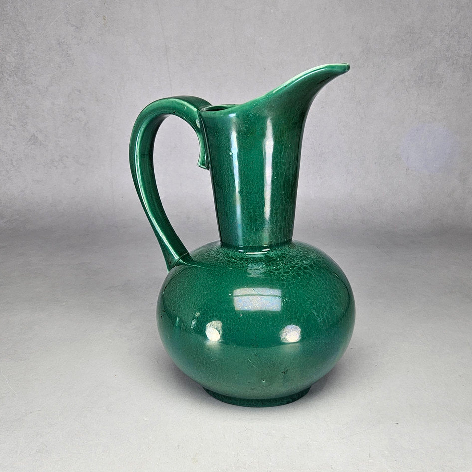 Lucia Ware green tall-neck ewer showing elongated pouring lip