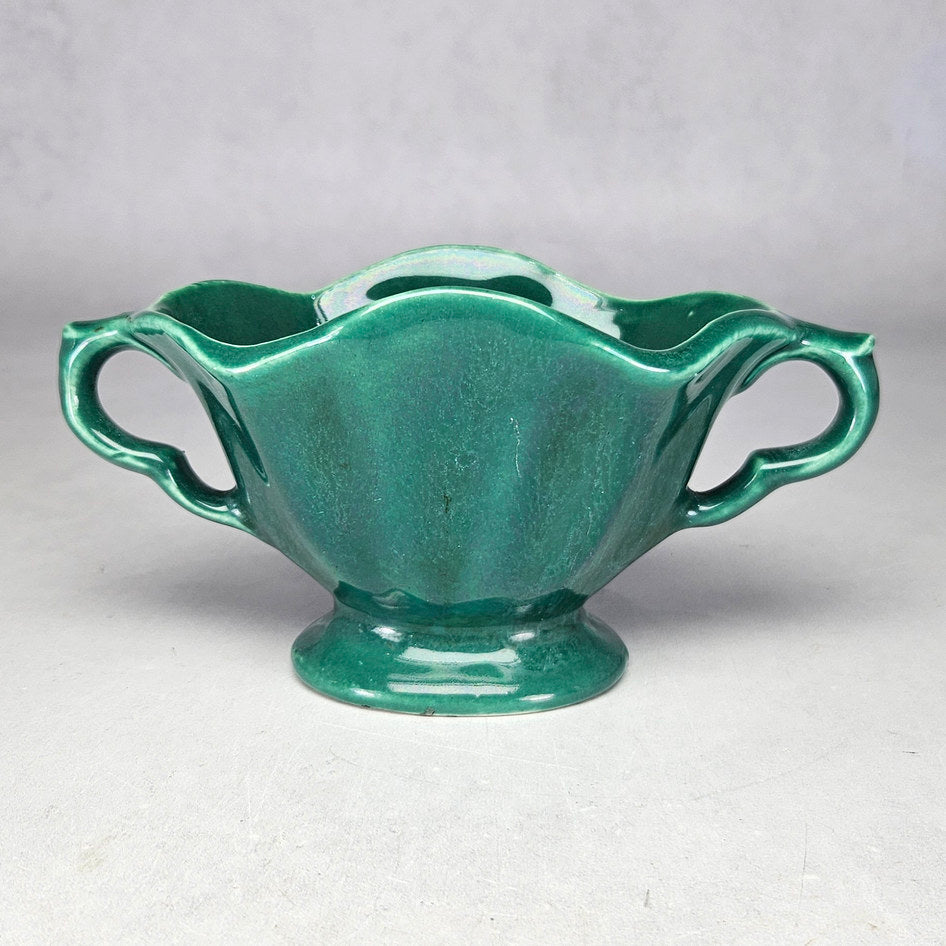 Lucia Ware green footed bowl with twin open handles