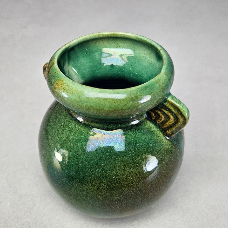Lucia Ware mottled green ceramic vase with twin ridged handles