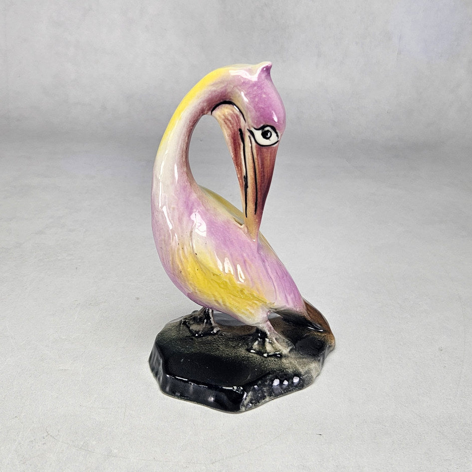 Lucia Ware pink and yellow ceramic pelican figurine model 6012