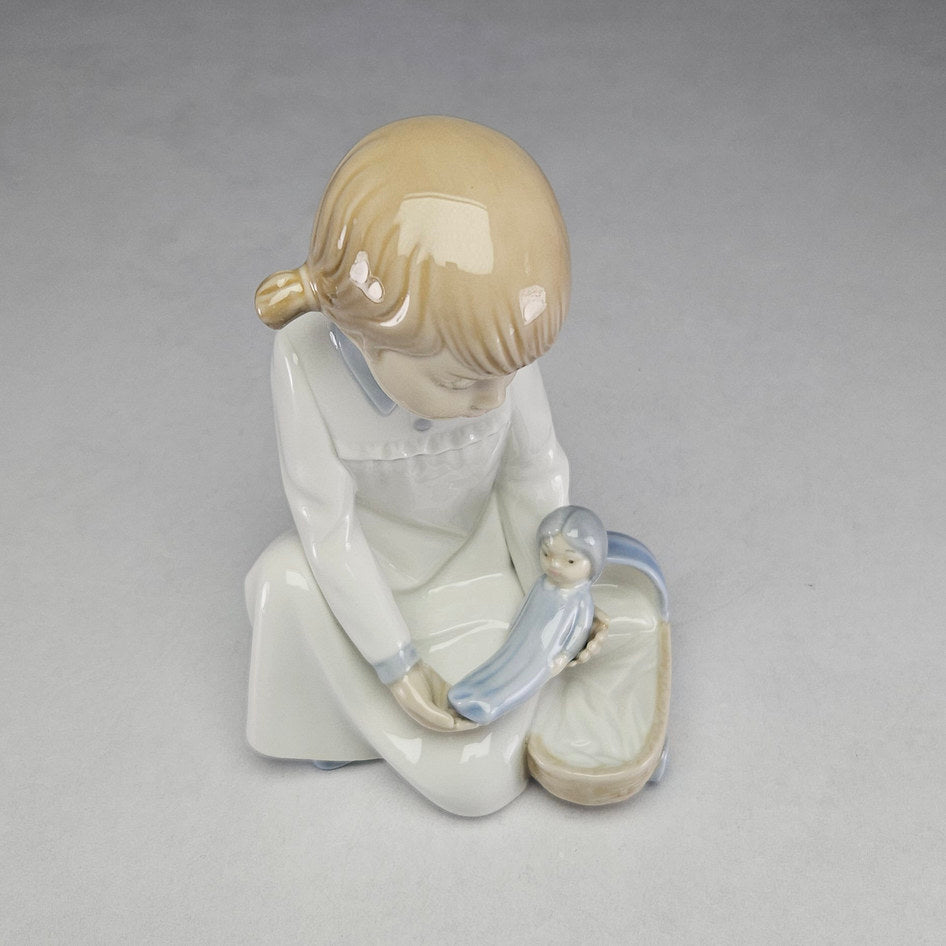 NAO by Lladró Girl with Baby Doll Porcelain Figurine