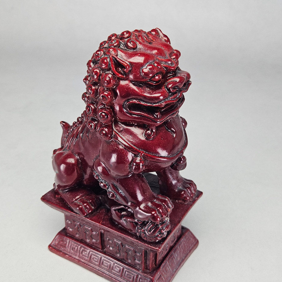 Pair of Chinese Red Cinnabar-Style Resin Foo Dog Figurines