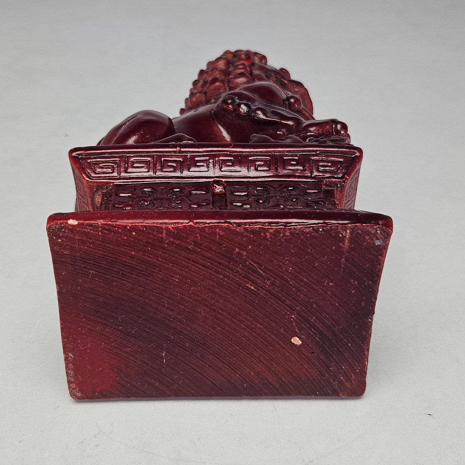 Pair of Chinese Red Cinnabar-Style Resin Foo Dog Figurines