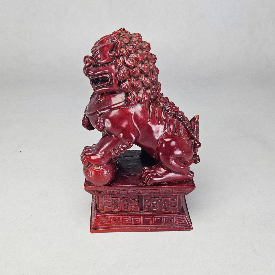 Pair of Chinese Red Cinnabar-Style Resin Foo Dog Figurines