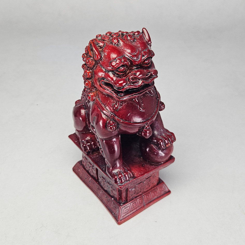 Pair of Chinese Red Cinnabar-Style Resin Foo Dog Figurines