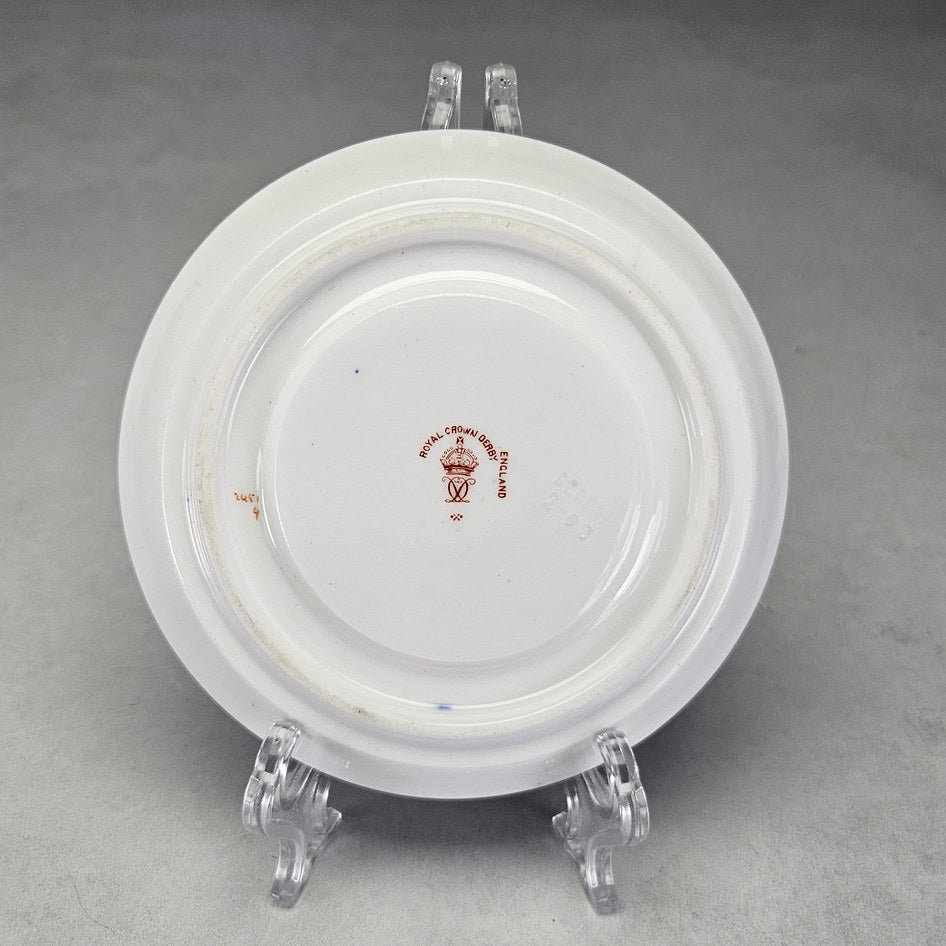 Royal Crown Derby 2451 coffee saucer with close floral and border details