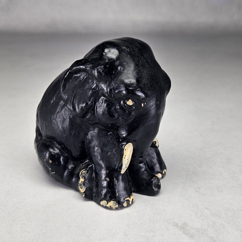 Black seated English ceramic elephant attributed to Sylvac, photograph 2 of this collectible ceramic piece