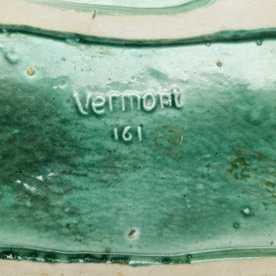 Vermont log planter base close-up showing impressed model marking