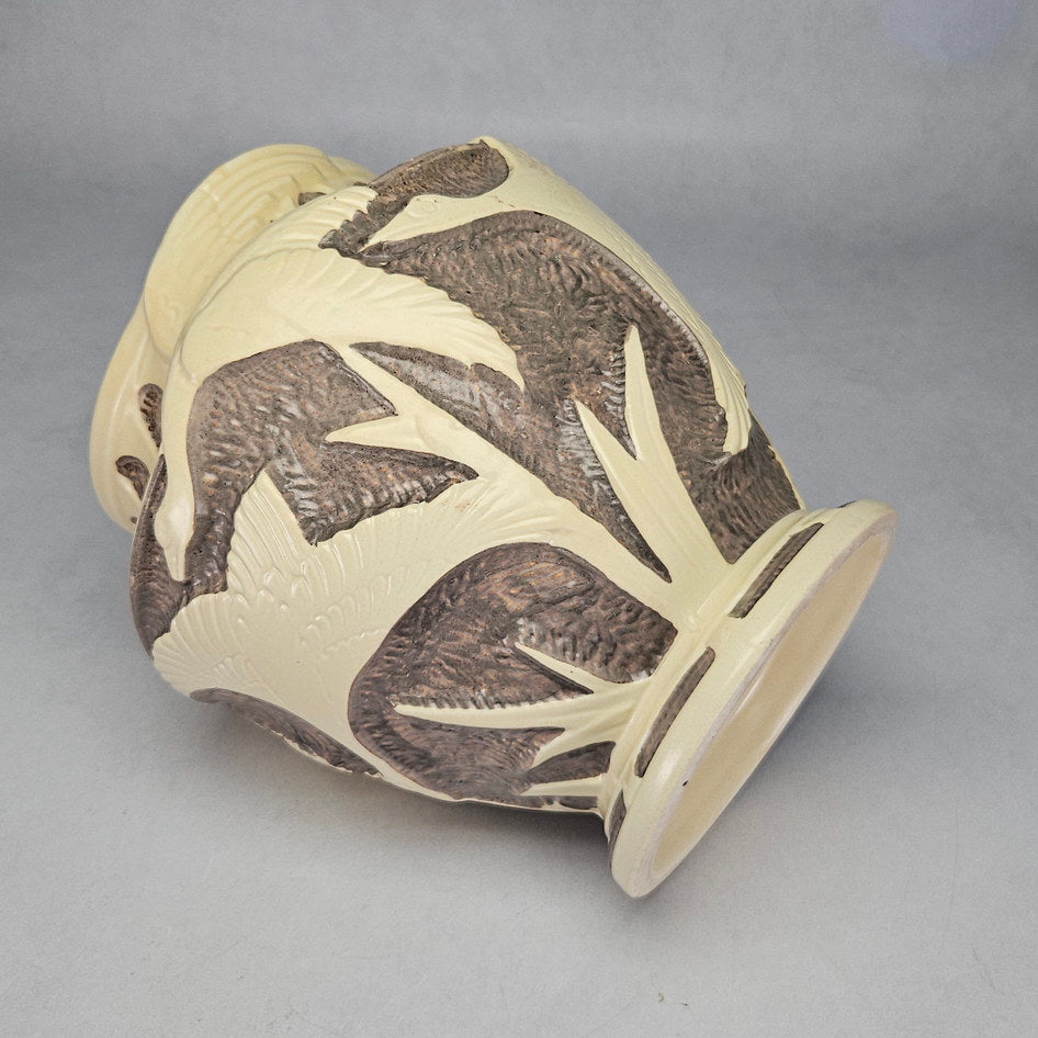 Close up of embossed leaf decoration on Burleigh Ware vase